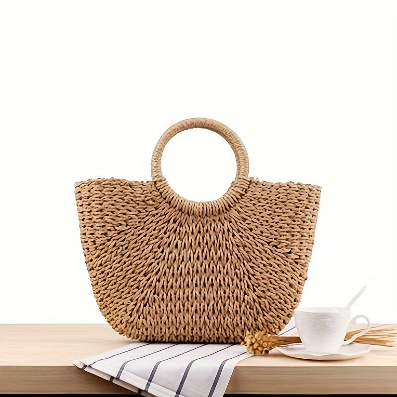 SERENELLA | Bolso en forma de media luna de paja trenzada color coñac